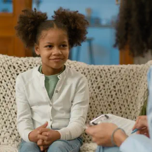 Young Girl Smiles During Session