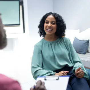 Woman Talking with Professional 